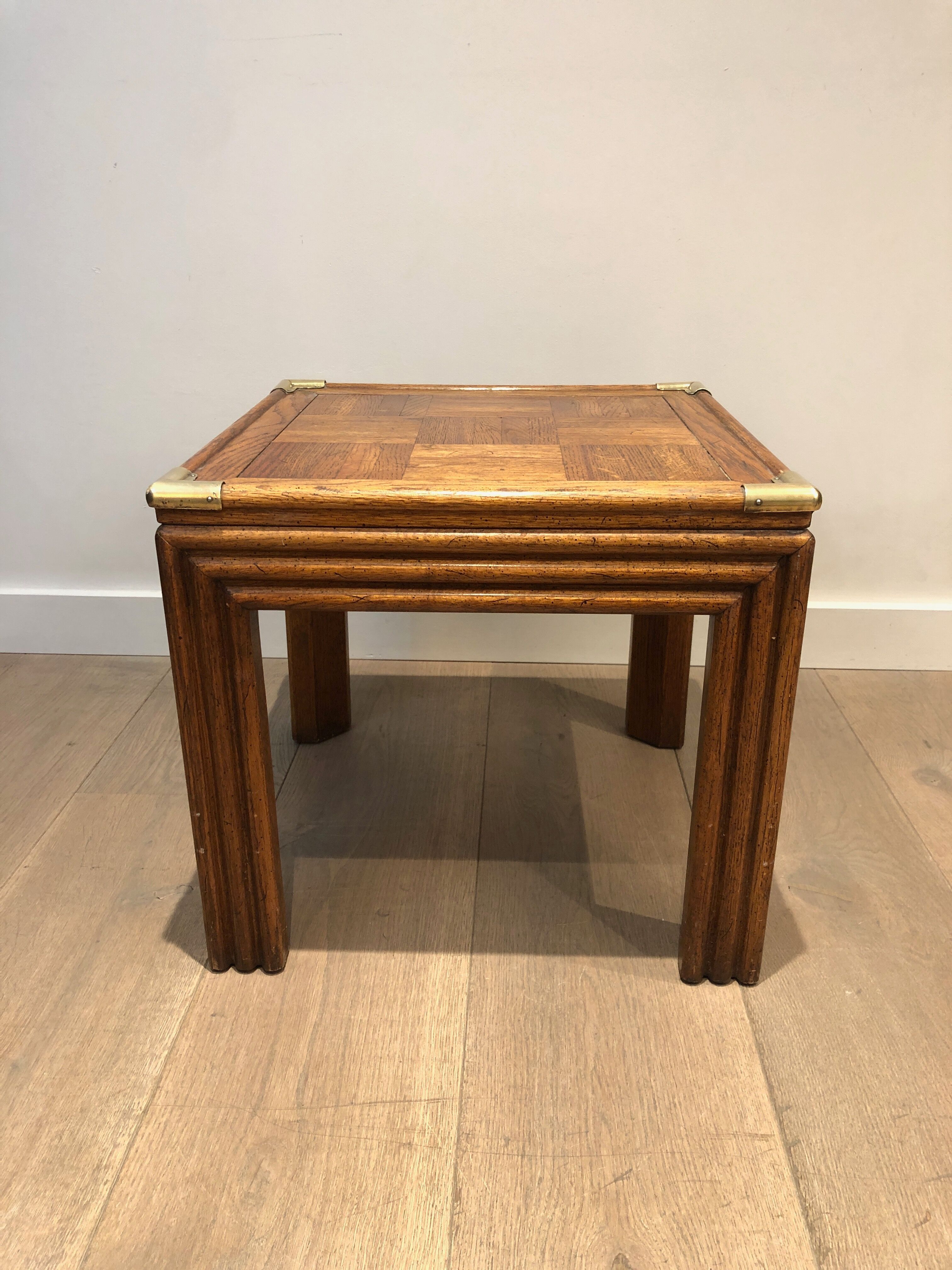 Pair of wooden and brass sofa ends