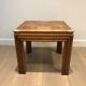 Pair of wooden and brass sofa ends