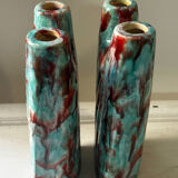Vintage pair of turquoise and red ceramic candlesticks