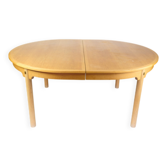 Table à manger ovale modèle 140 en chêne et laiton par Borge Mogensen des années 1950