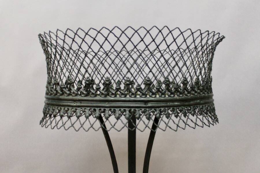 Wrought iron planter on stand