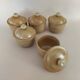 Covered tea bowls in CNP Village sandstone
