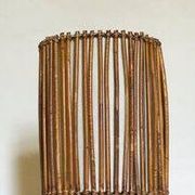 Mid-century rattan floor lamp, in the style of Louis Sognot.