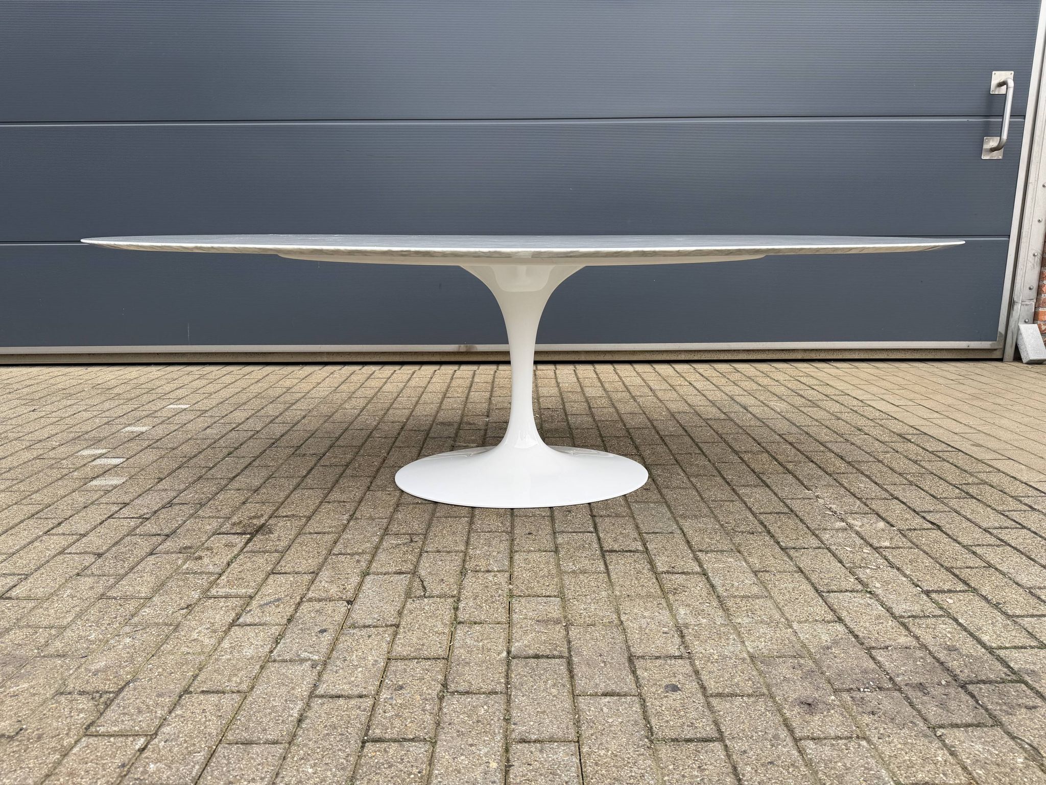 Original Knoll Tulip oval dining table (244cm) in Carrara marble.