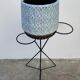 Black metal tripod plant holder