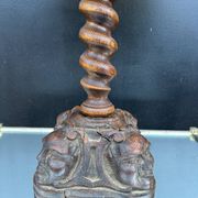 Sculpted wooden lamp with faces, antique.