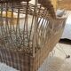 Rattan and wrought iron cradle