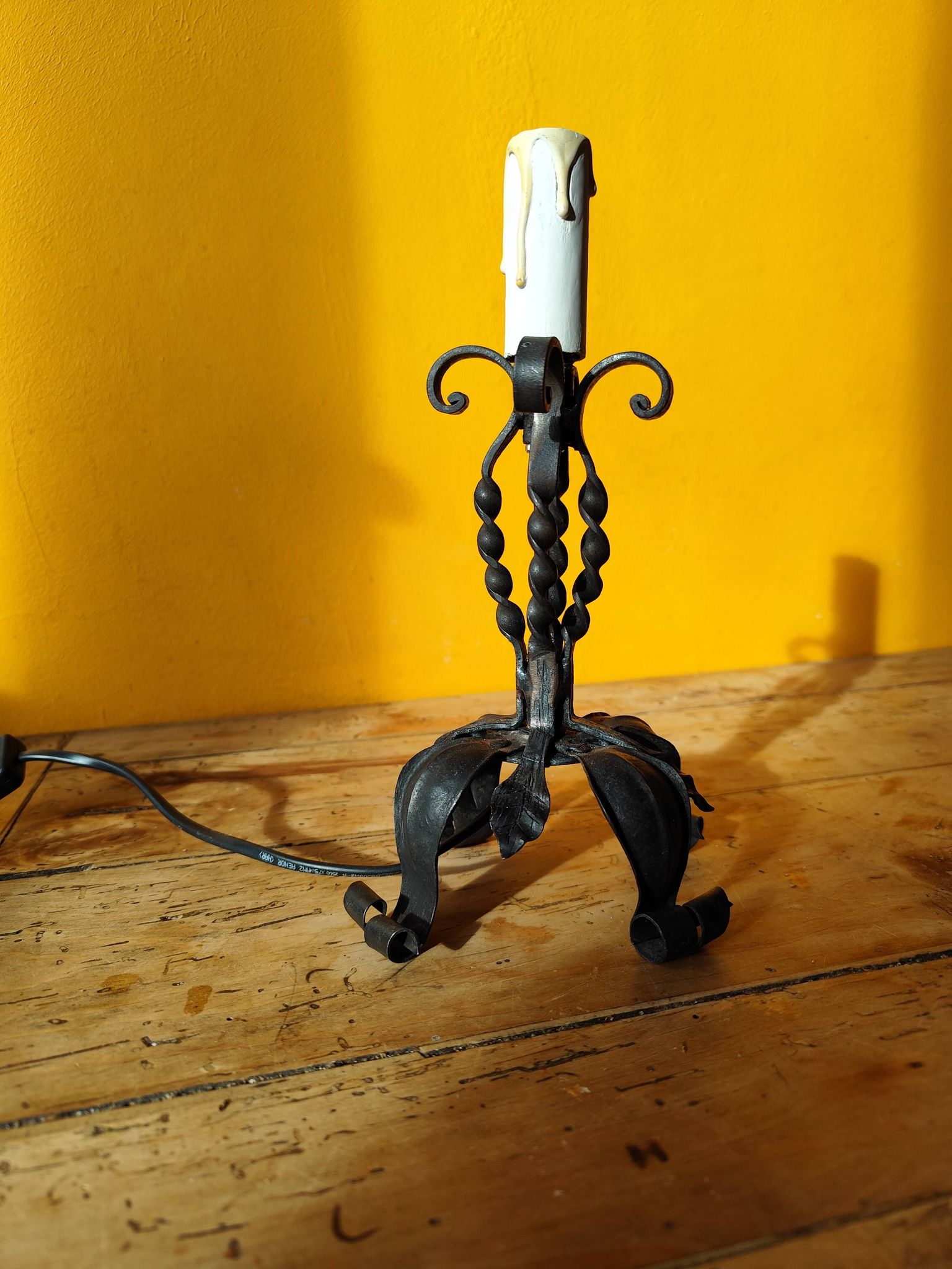 Old metal lamp and fake candle