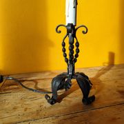 Old metal lamp and fake candle
