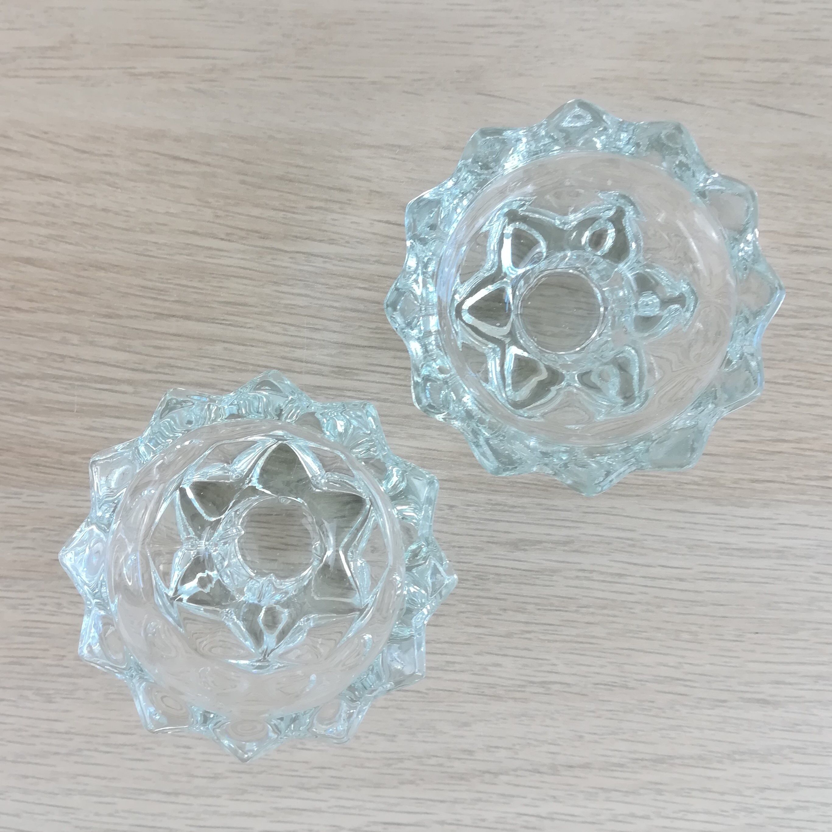 Pair of glass star candle holders