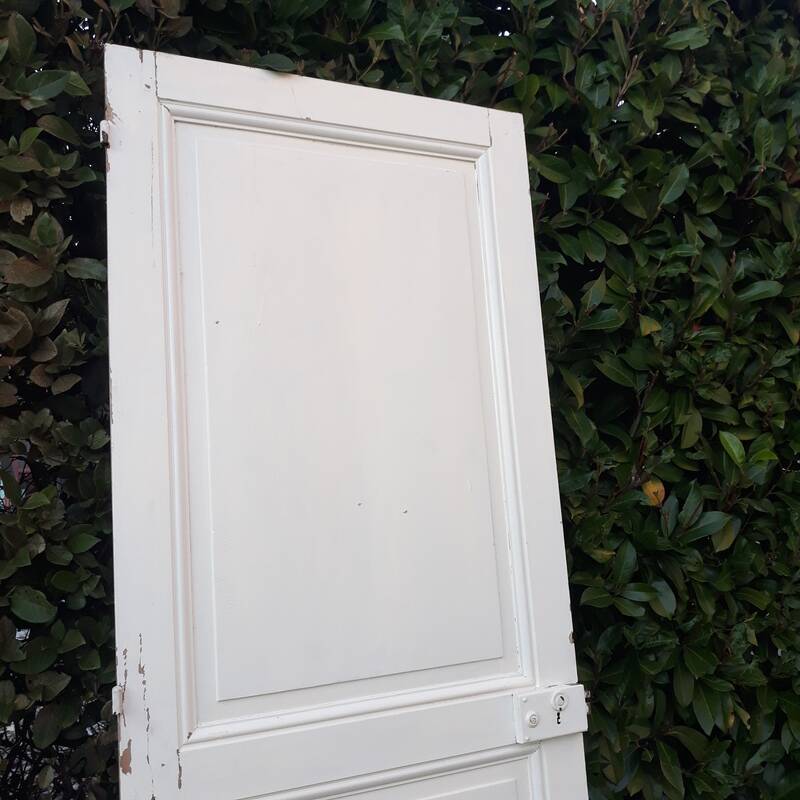 Communication door H220xW80.5cm, old panelled with moulding.