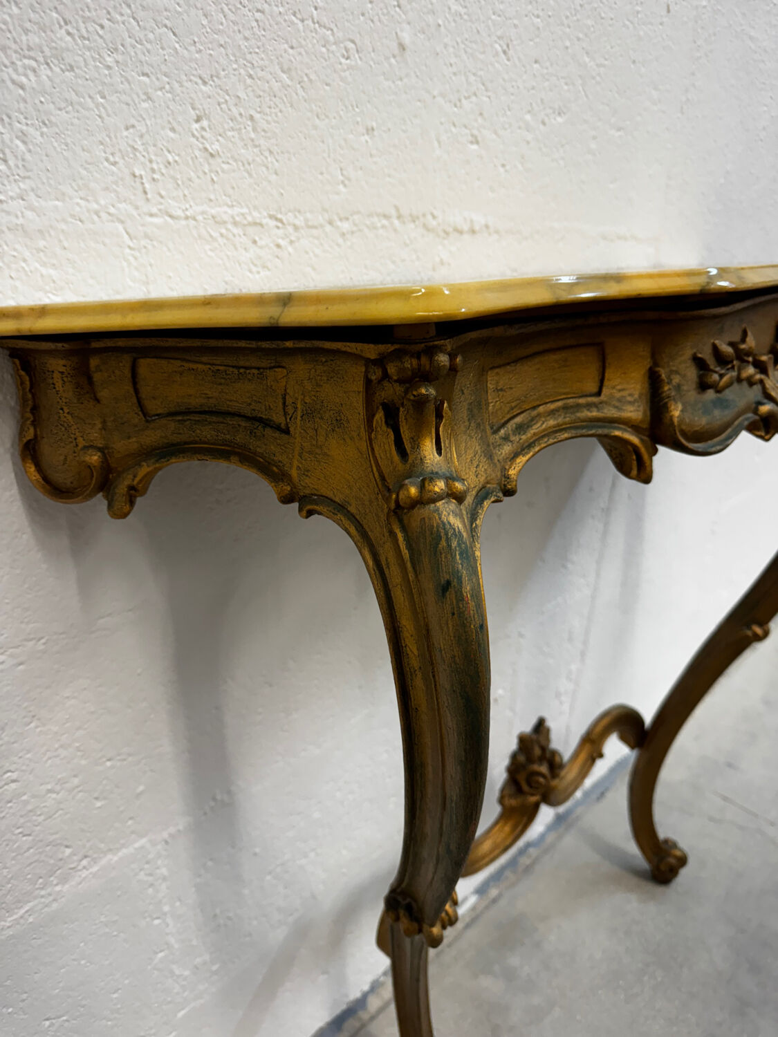 Carved gilded wooden console and marble in Louis XV style