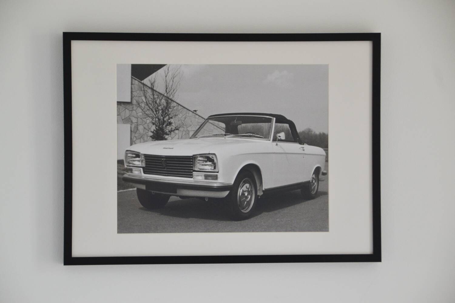 Large framed photograph of a Peugeot 304 convertible