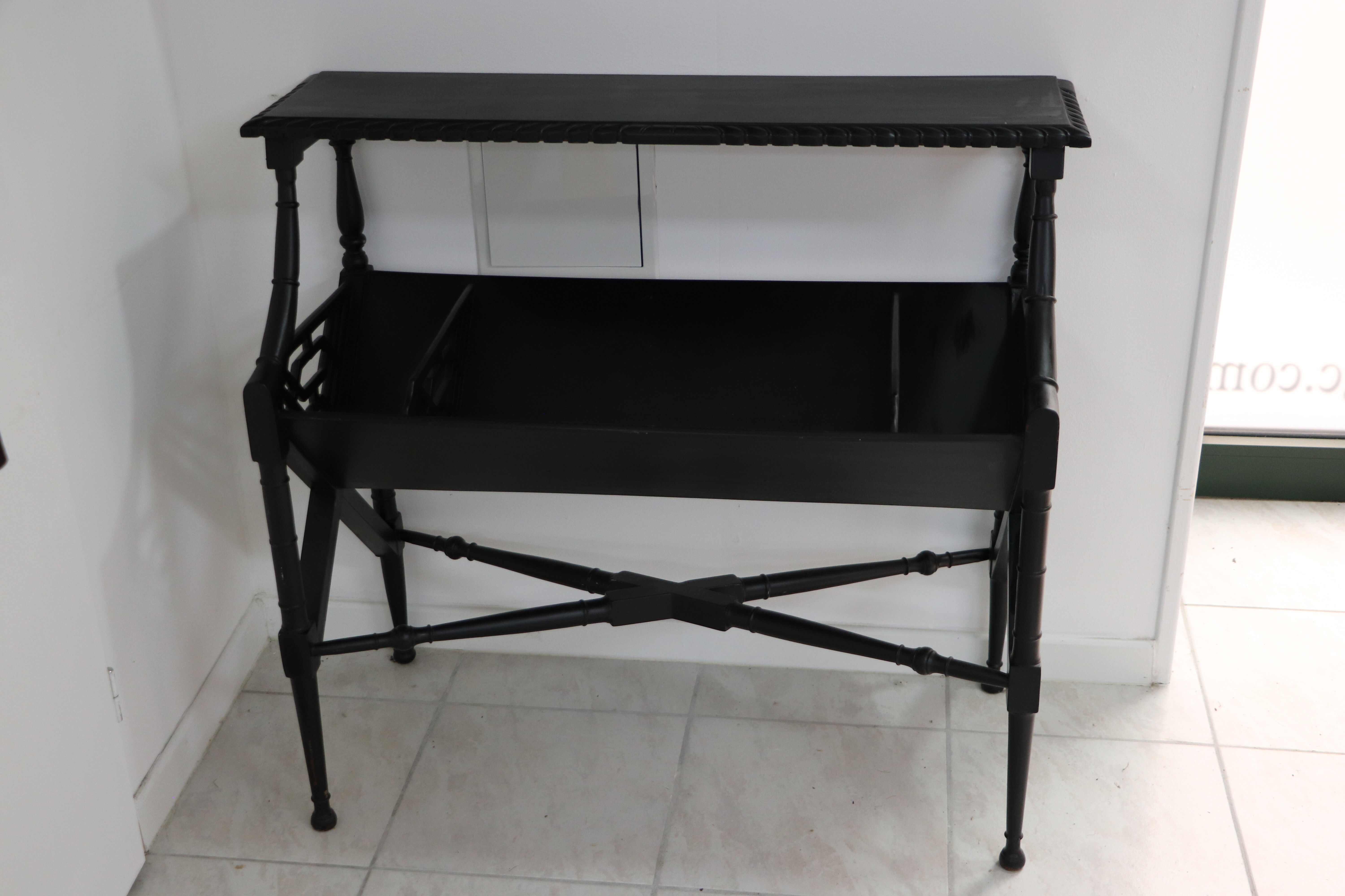Black lacquered Indochinese console with disk storage