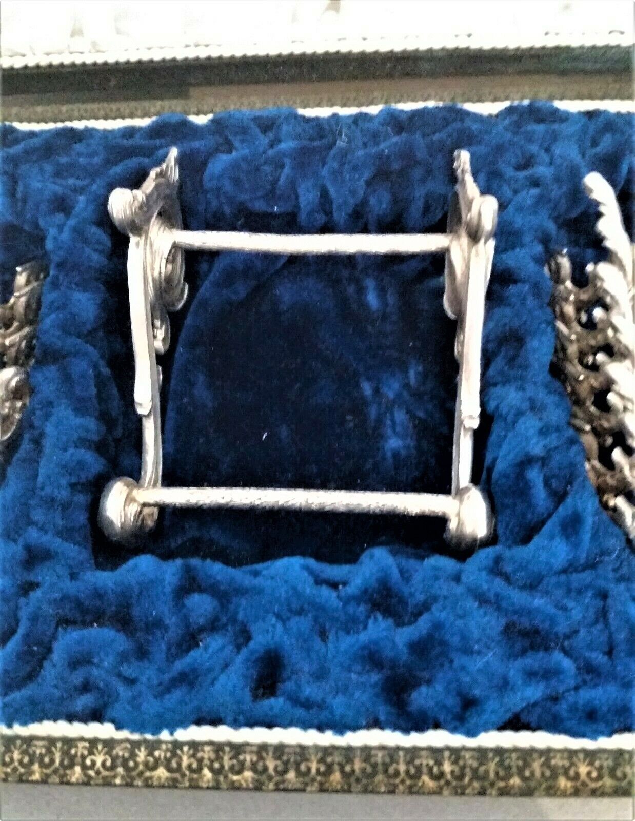 Twelve knife holders with ladle doors.