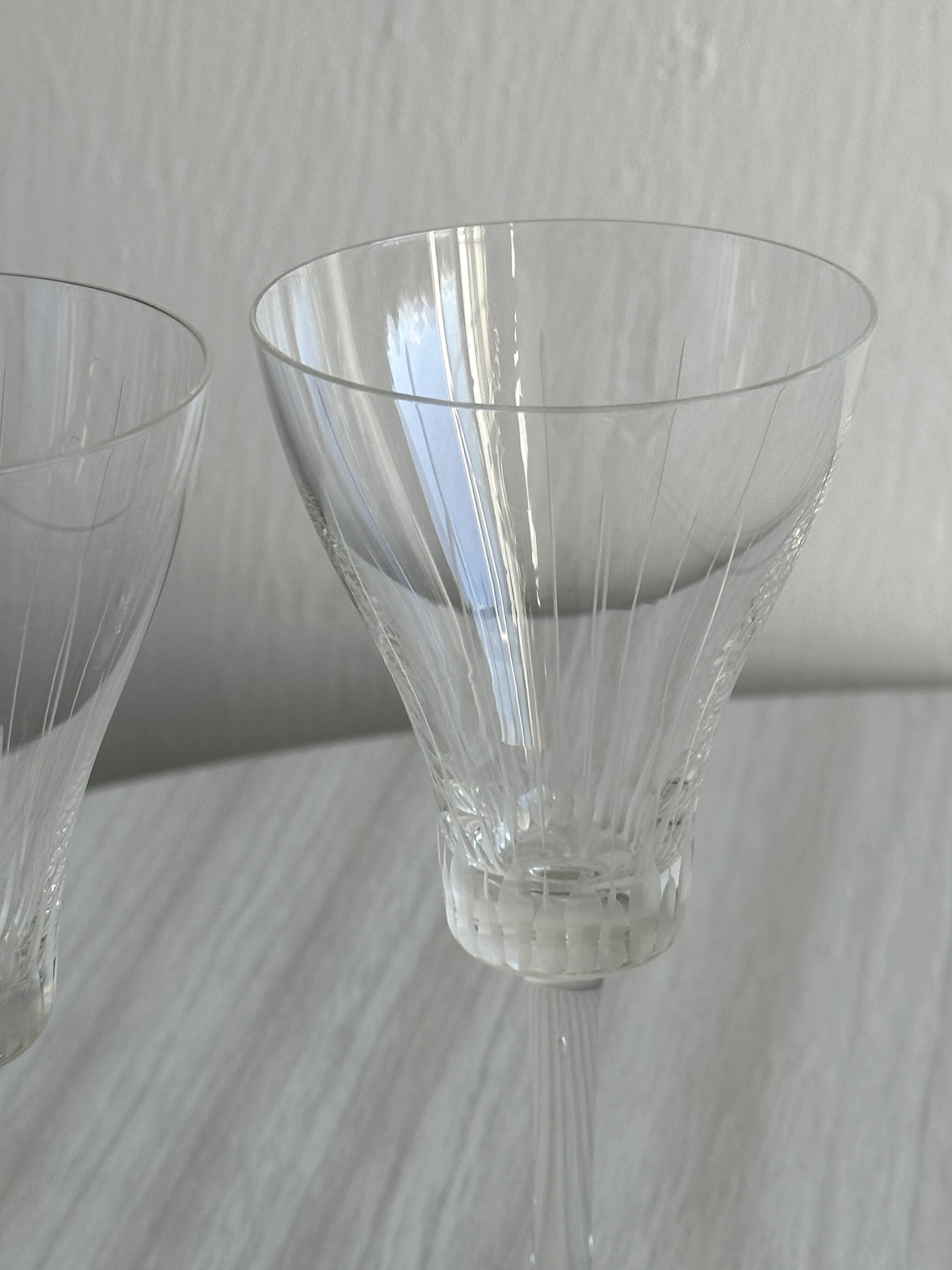 Two chiseled crystal liqueur glasses