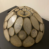 Mother-of-pearl and brass suspension