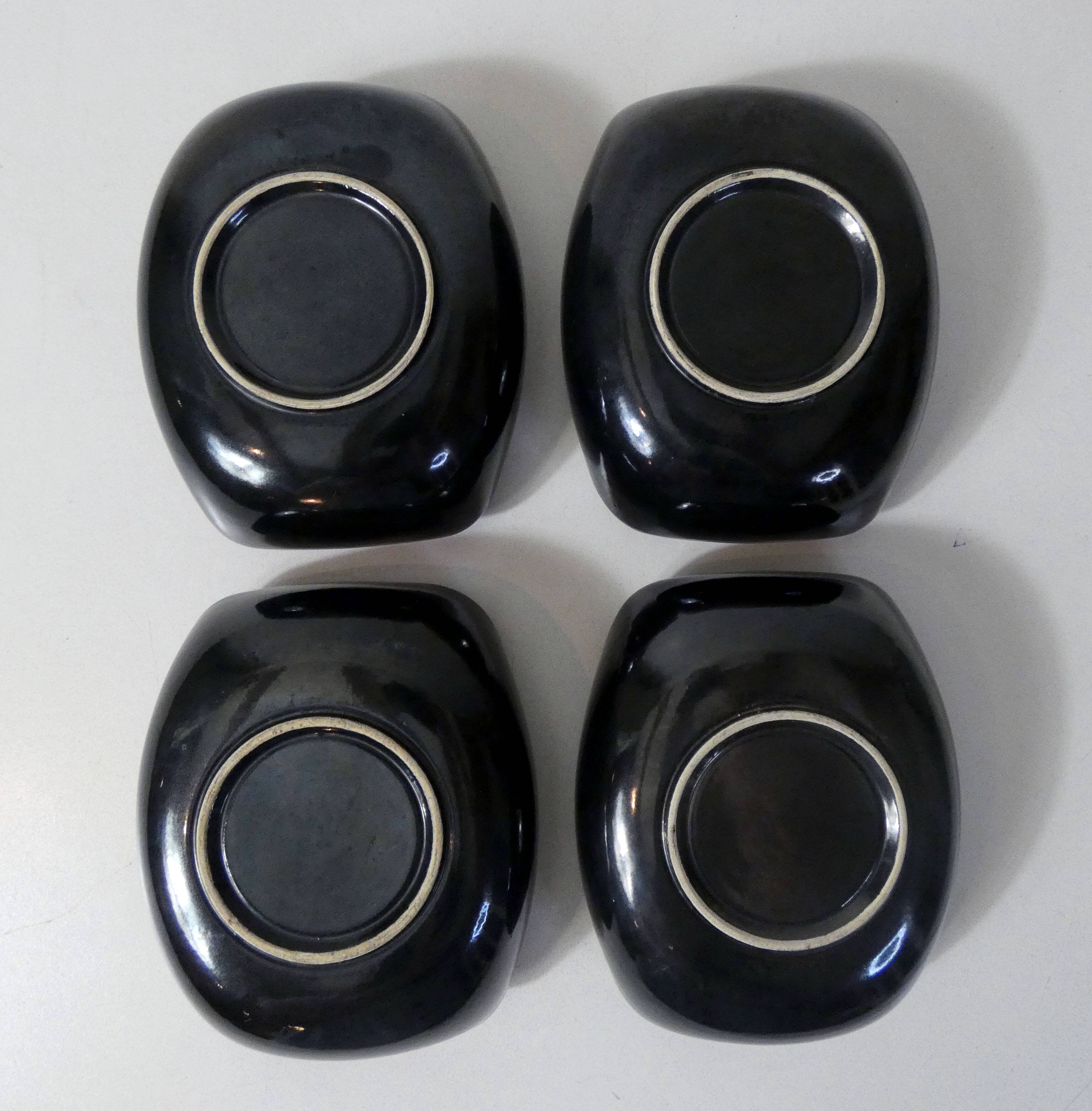 4 vintage ceramic bowls with free-form design