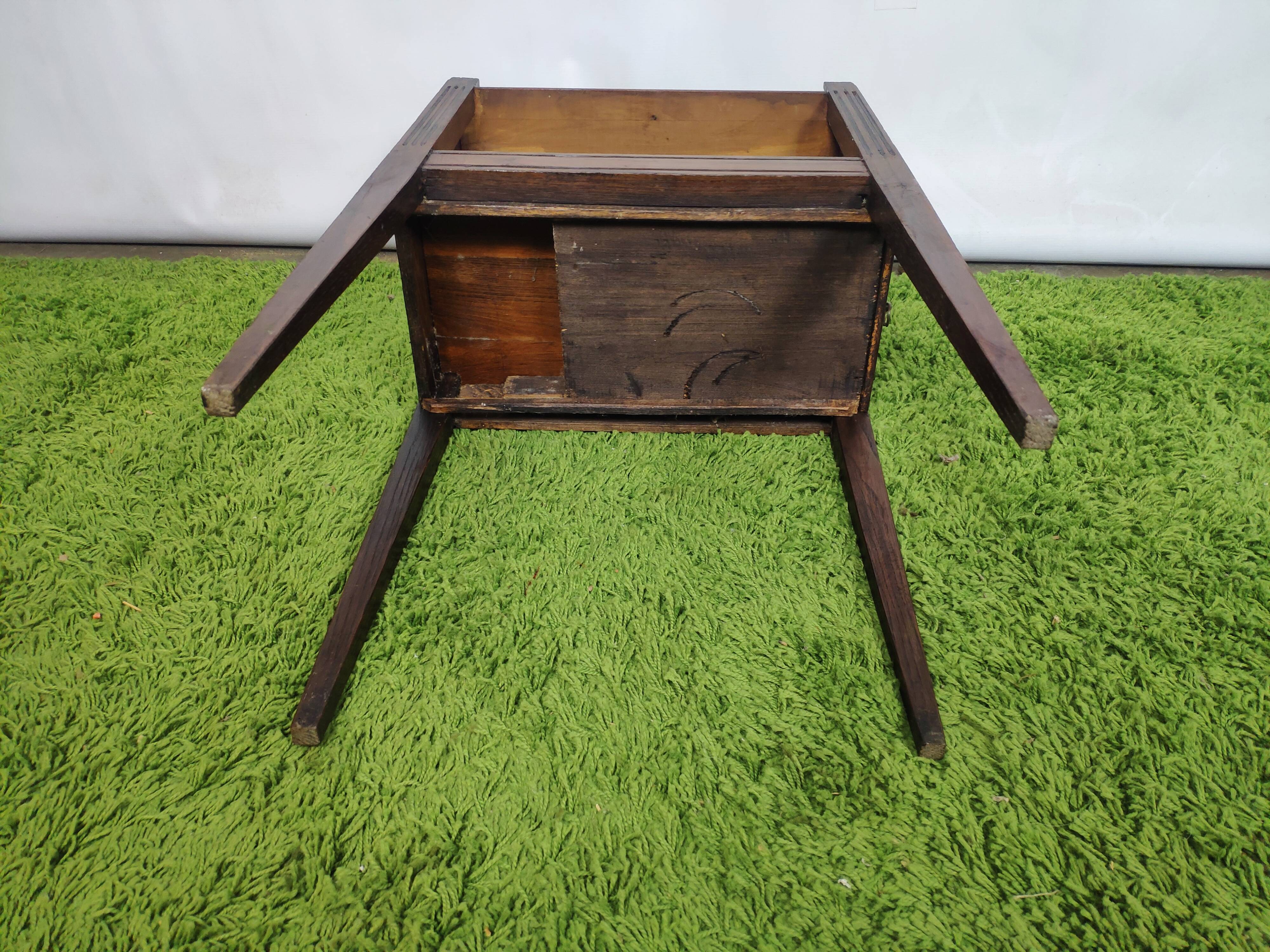 Old wooden bedside table