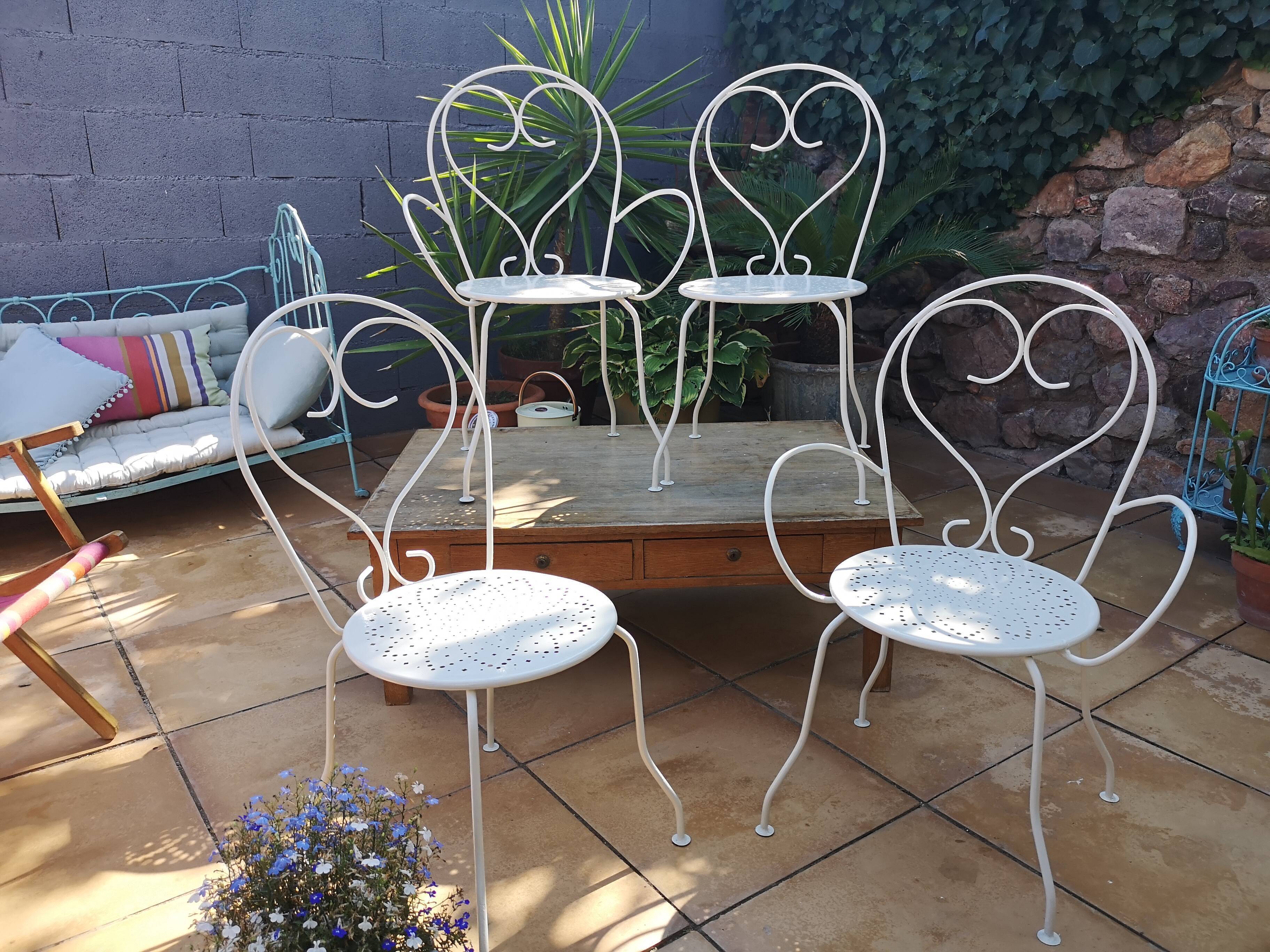 Lot of wrought iron chairs and armchairs