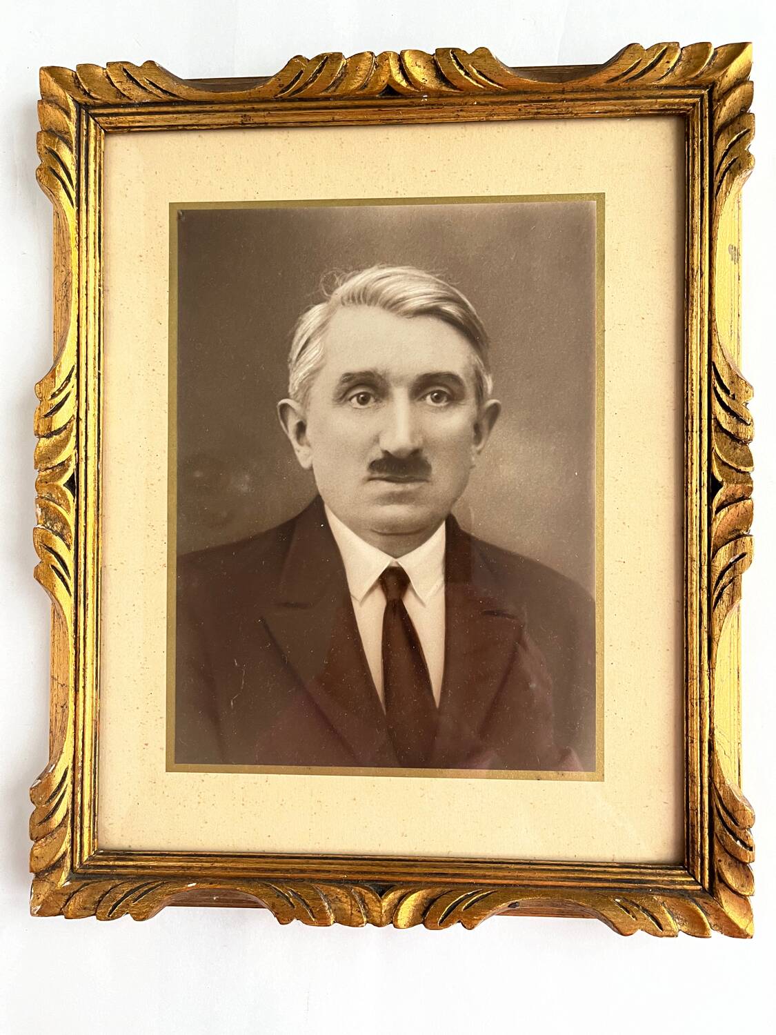 Old photo framed under glass