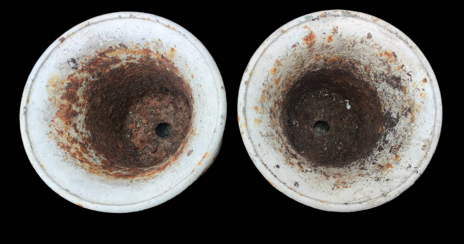 Series of 4 old cast iron vases