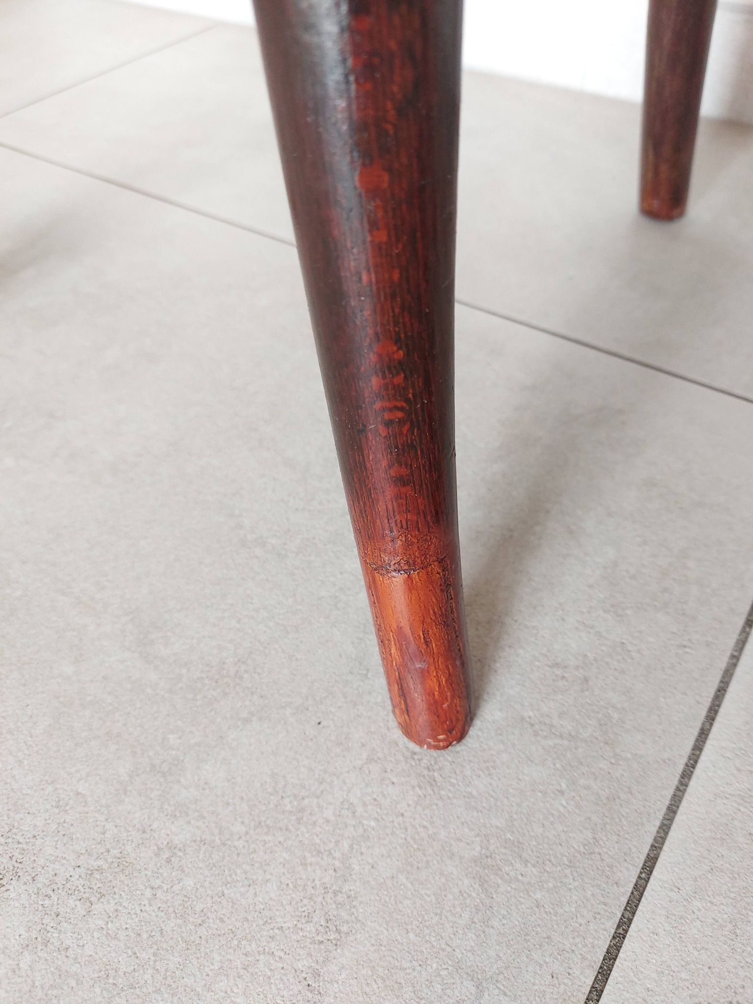 pair of round bistro chairs with a pattern on the seat, vintage