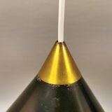 Cone pendant produced by Danish Lyfa in beautiful black lacquer with perforated shade and brass top.