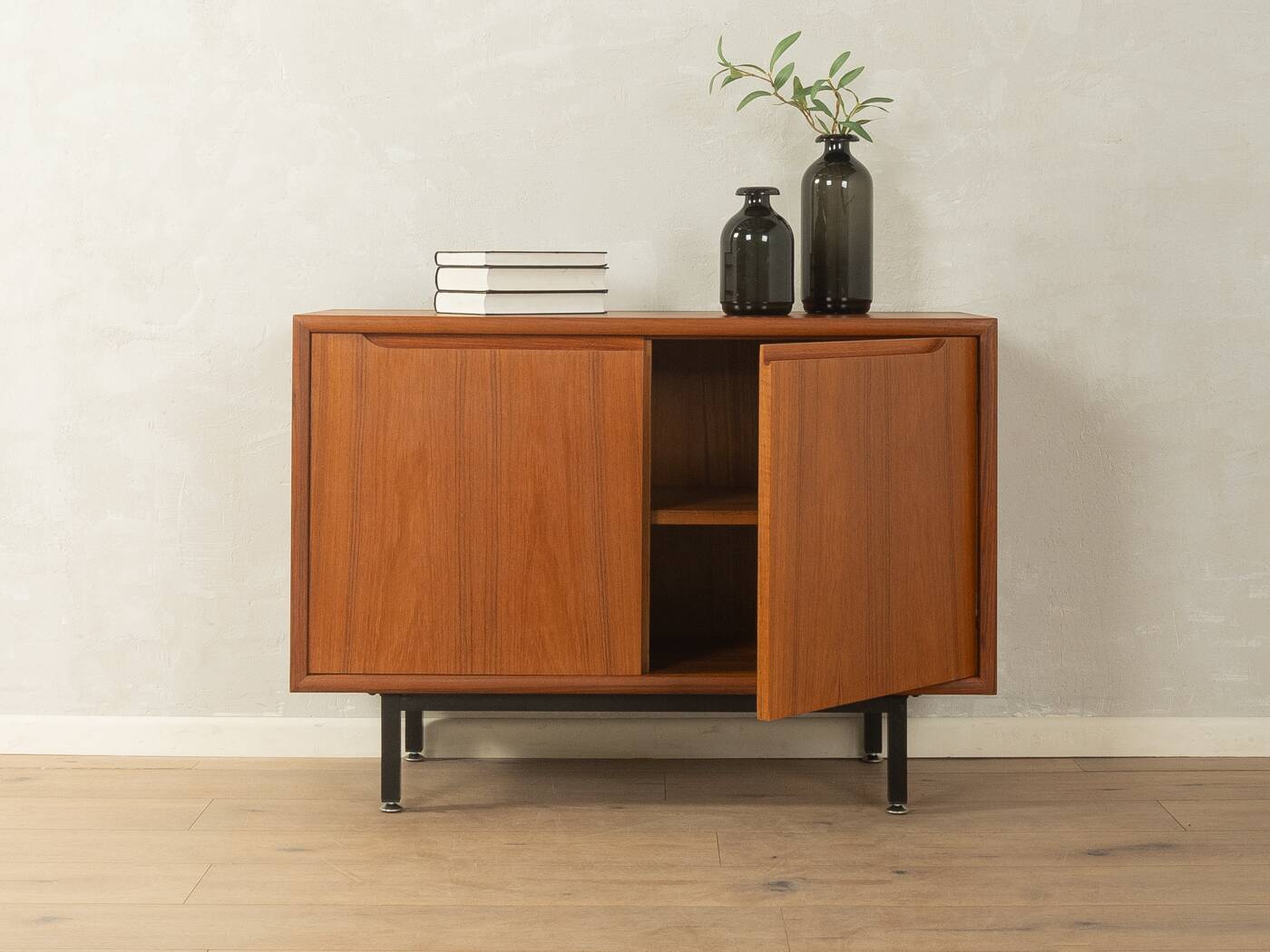 Classic chest of drawers from the 1960s with practical, closed storage space