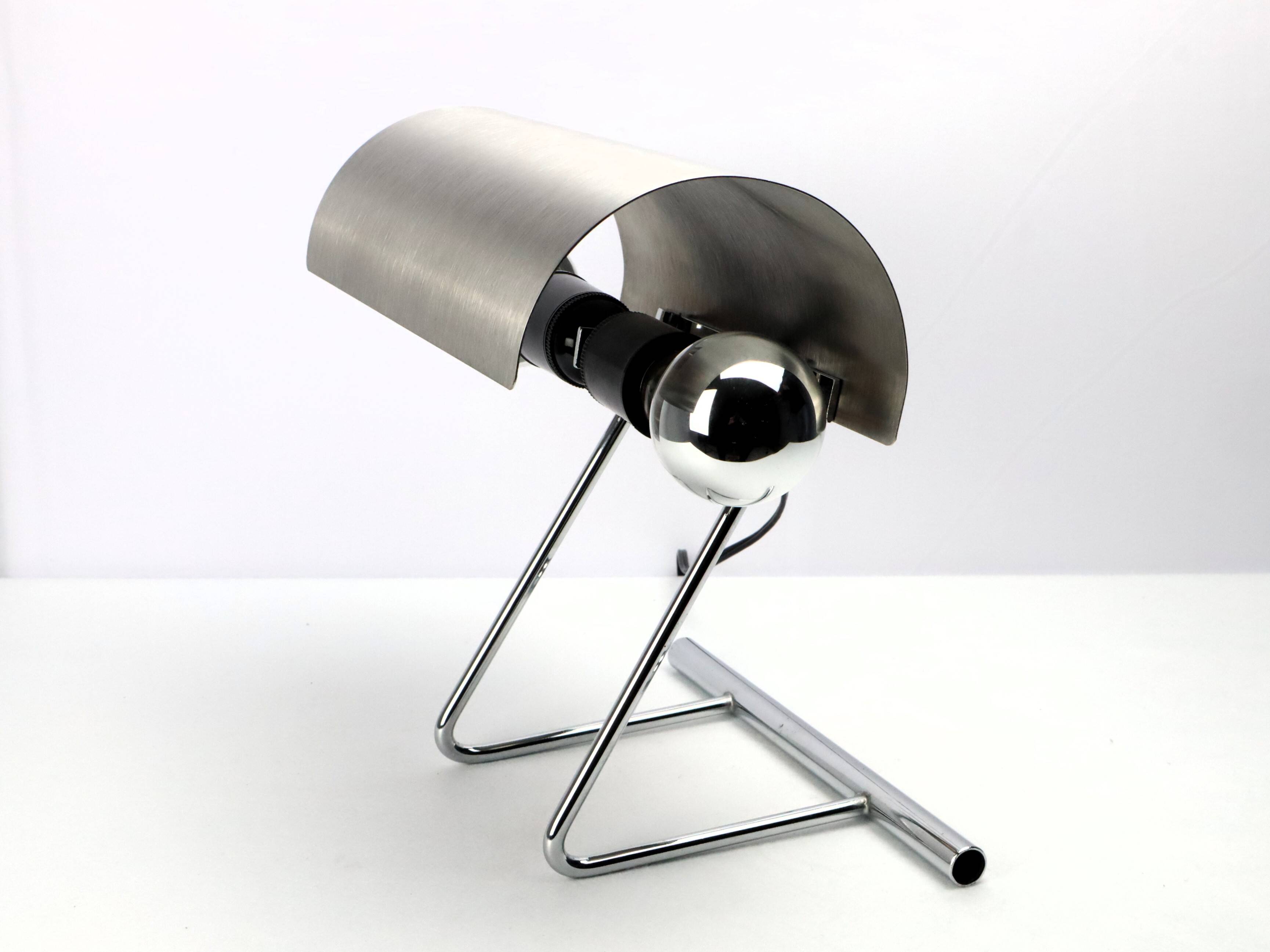 Stainless steel lamp from the 1970s in the style of François Monnet.