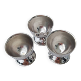 A set of 3 egg cups by Guy Degrenne.