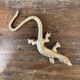 Small brass lizard
