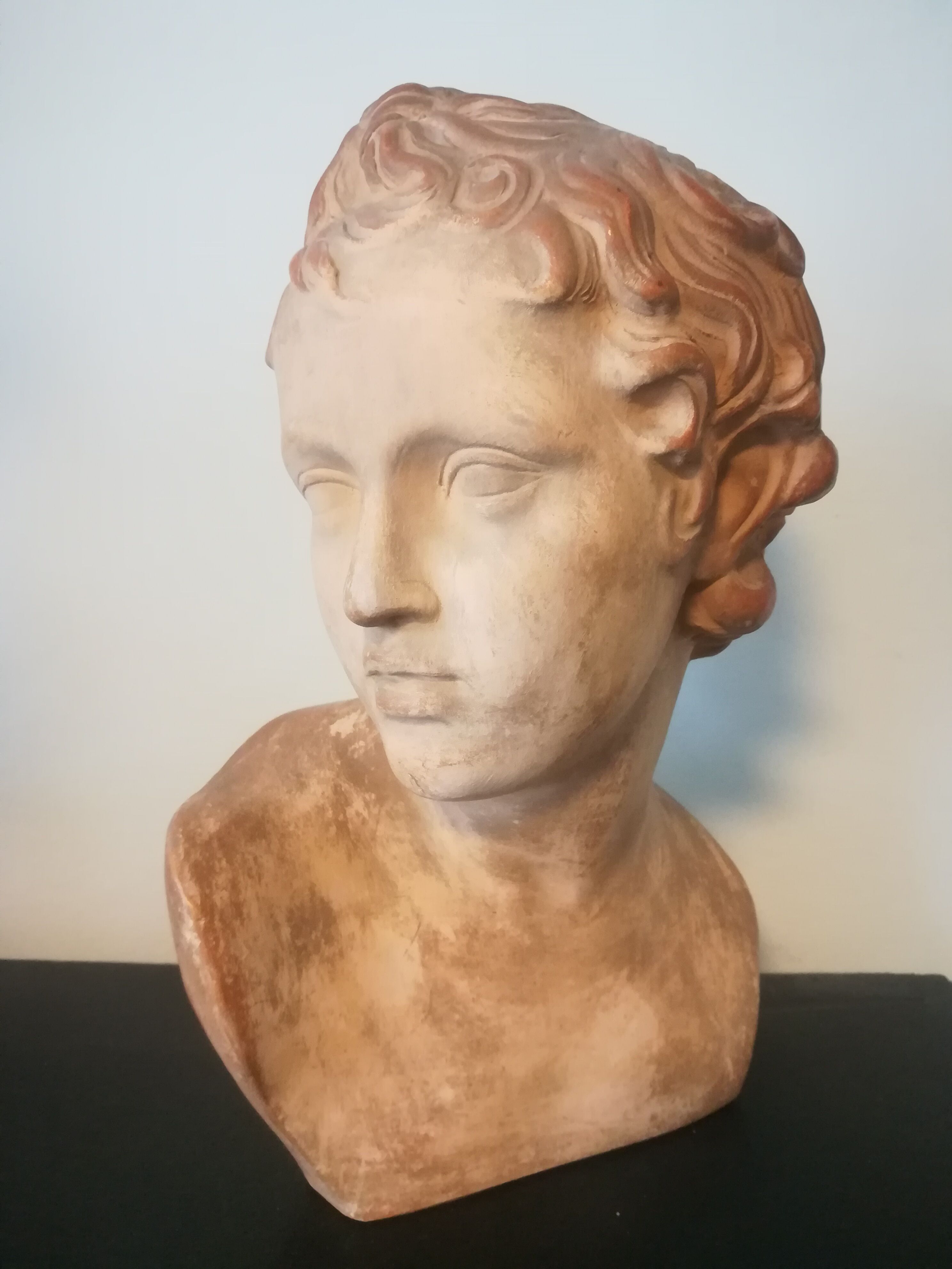 Children's bust in terracotta
