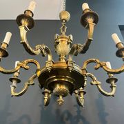 Important bronze chiseled chandelier in Louis XVI style with 8 light arms by Lucien Gau.