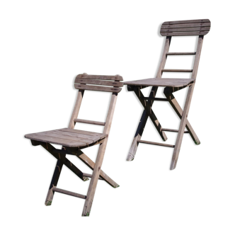 Ensemble de deux chaises pliantes en bois vintage