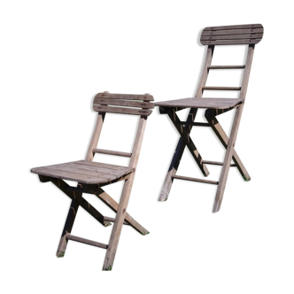 Set of two vintage wooden folding chairs