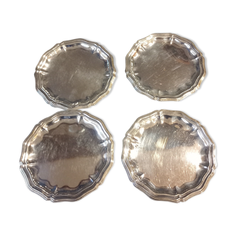 Four silver metal bottle bottoms