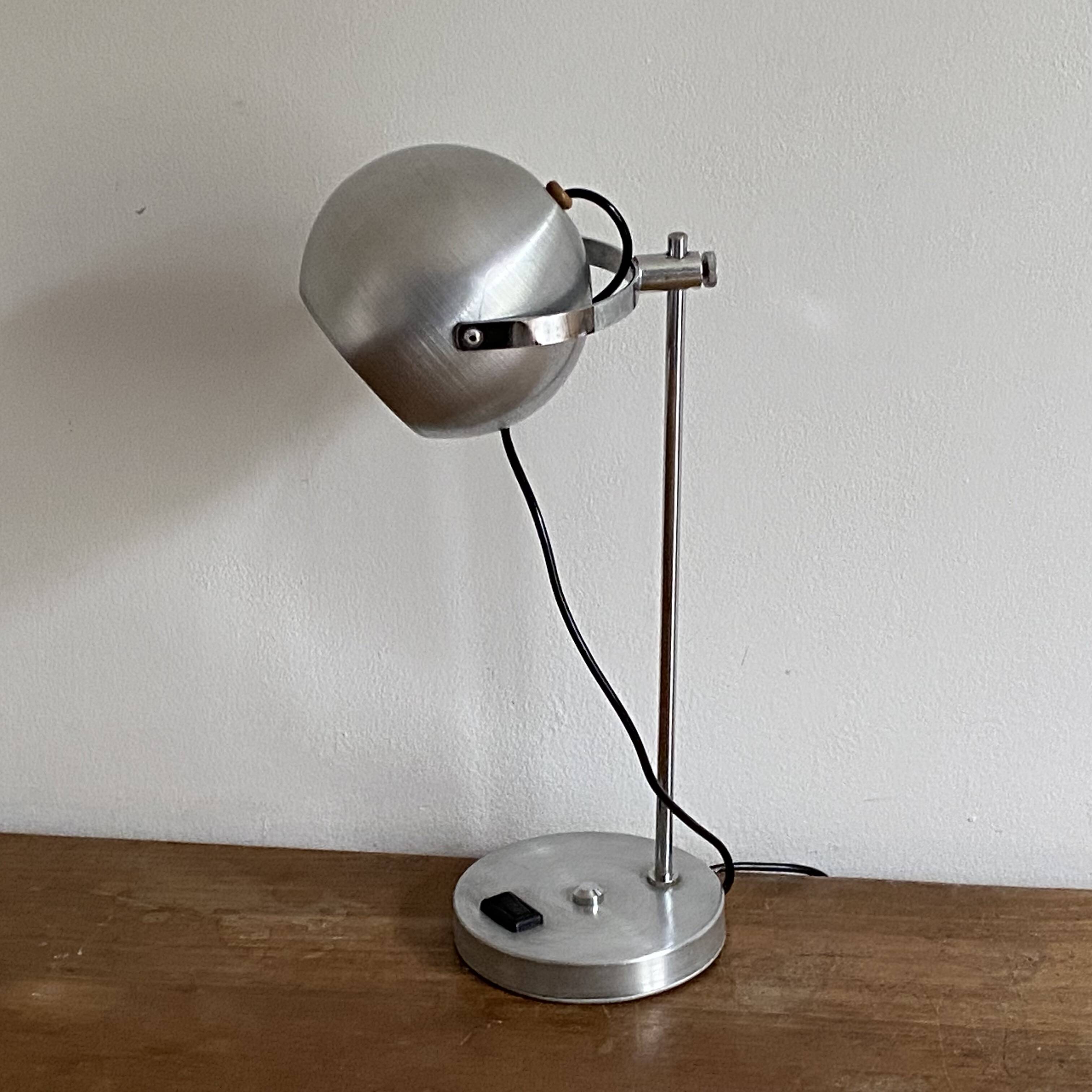 Eye ball lamp. 1970. Brushed stainless steel.