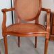 Antique Louis XVI style cane armchair