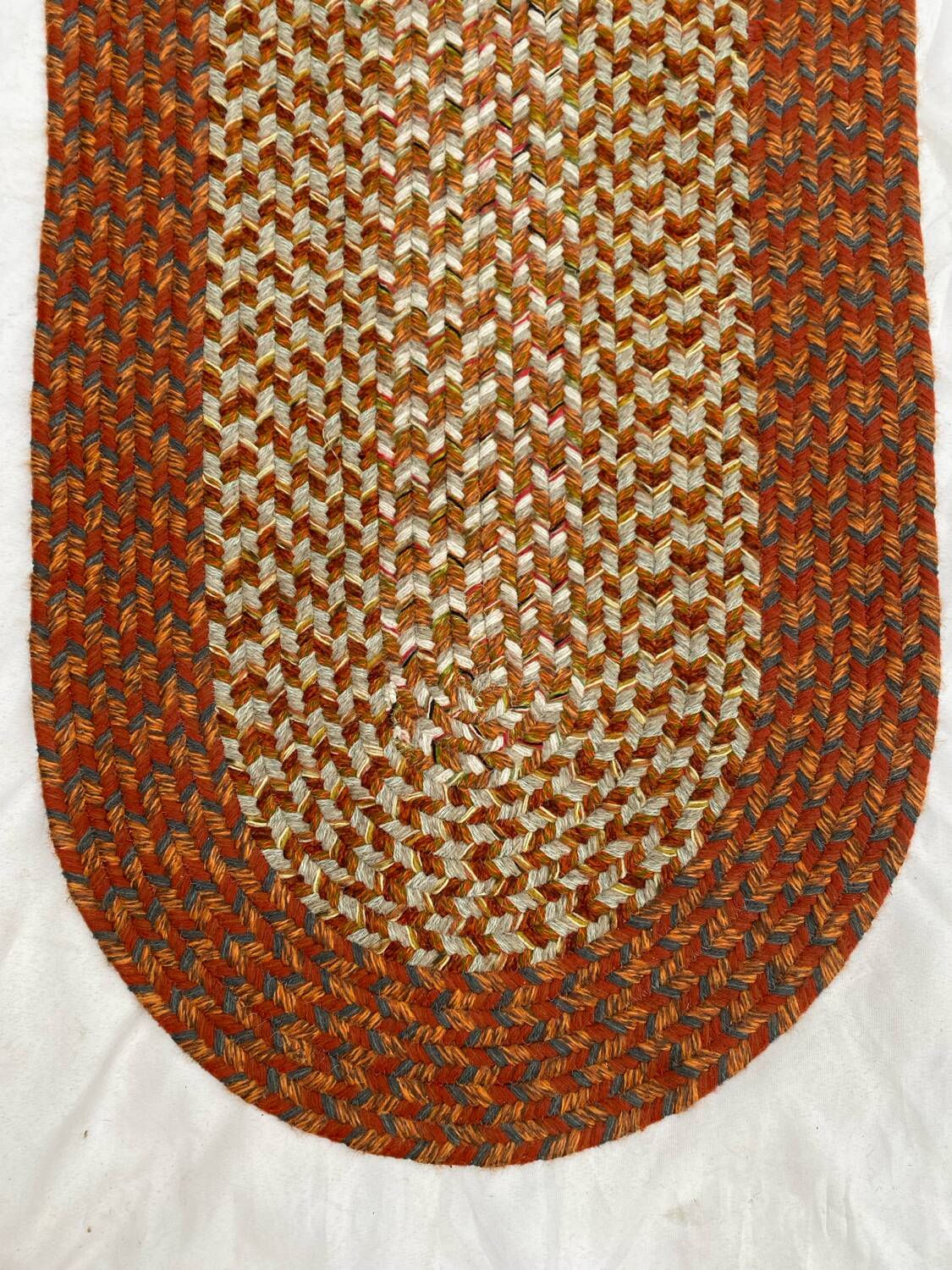 Oval wool rug 57x172 cm