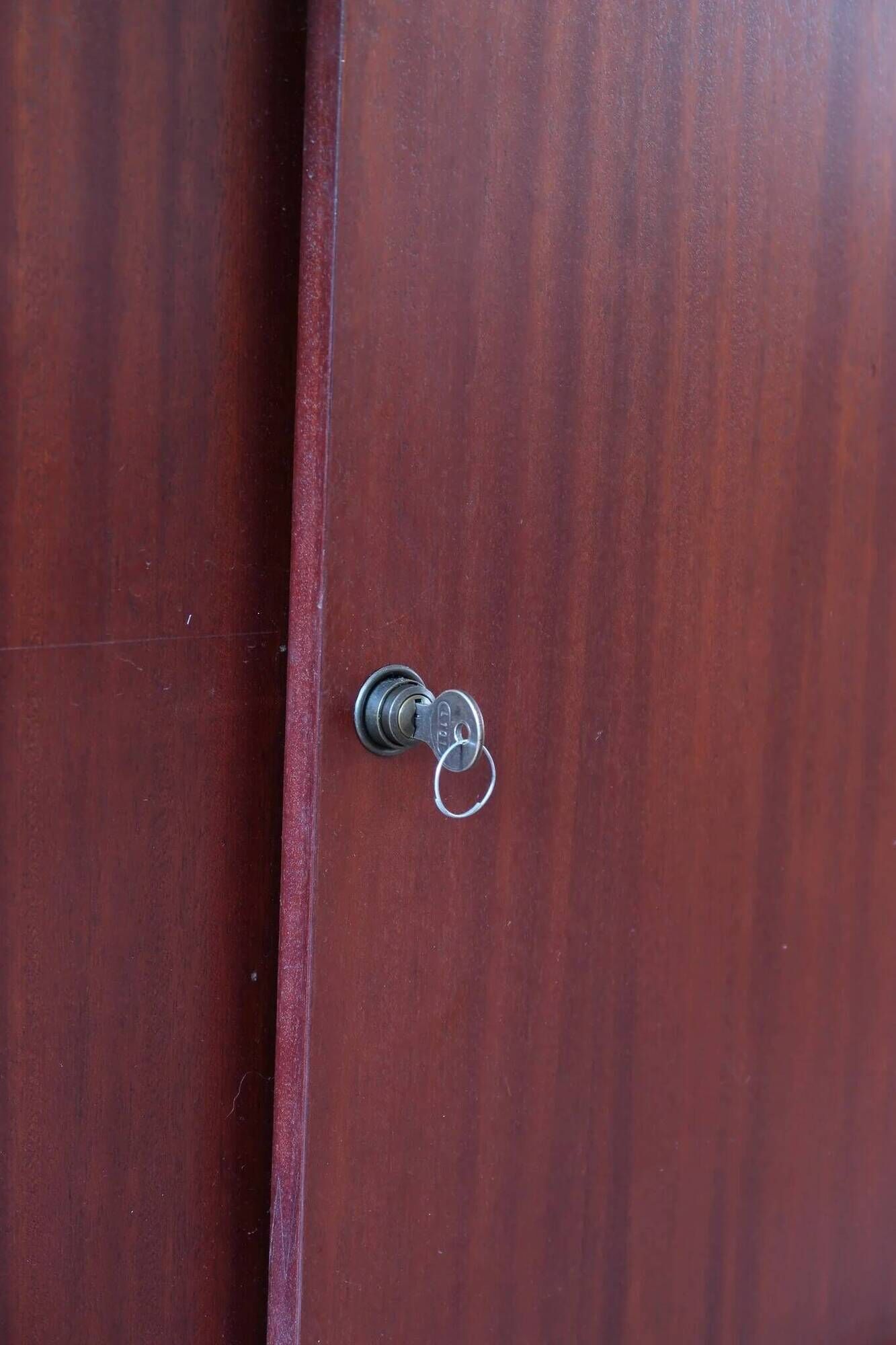 Teak enfilade, sliding doors, black faux leather top, 1970s.
