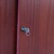 Teak enfilade, sliding doors, black faux leather top, 1970s.