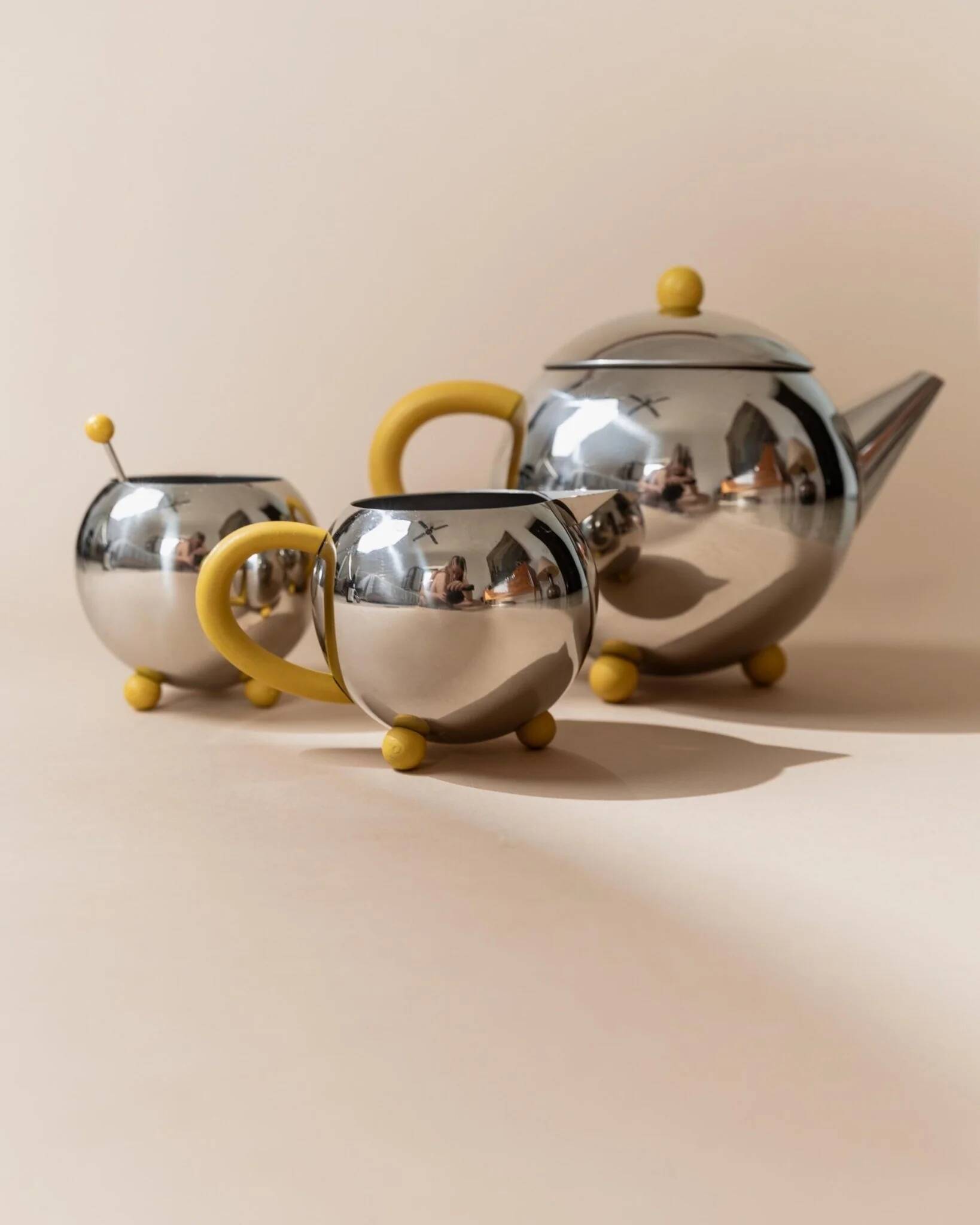 Space Age Vintage 1980s Stainless Steel Tea and Coffee Set with Yellow Accents Teapot Creamer and Sugar Bowl