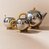 Space Age Vintage 1980s Stainless Steel Tea and Coffee Set with Yellow Accents Teapot Creamer and Sugar Bowl