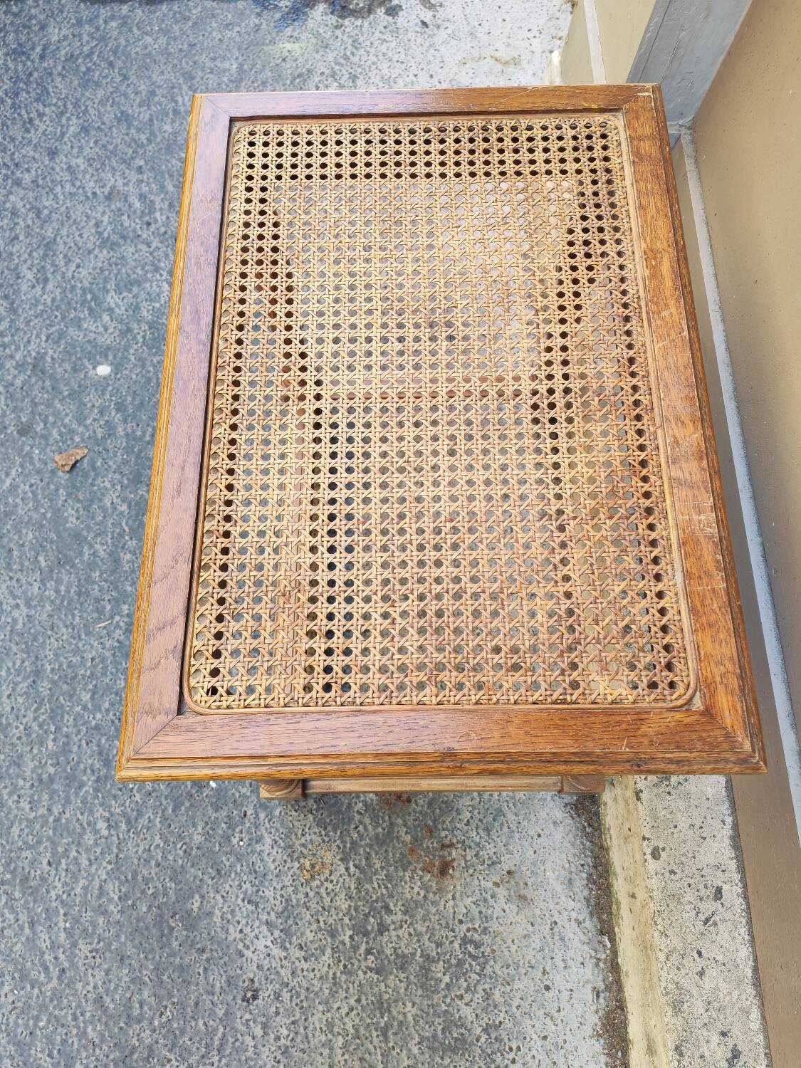 Wooden bench with caning
