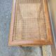 Wooden bench with caning