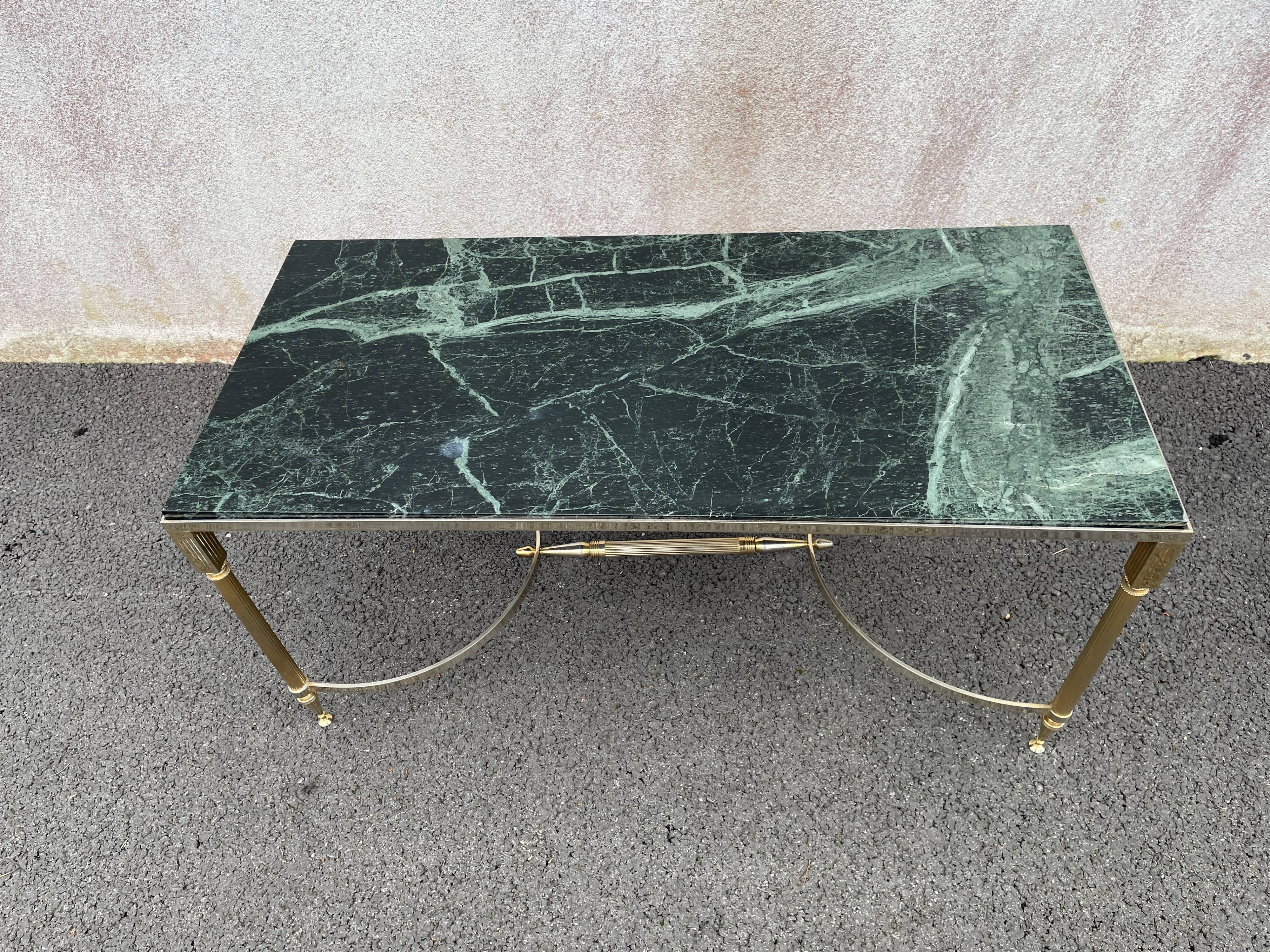Coffee table in gilded brass and veined green marble