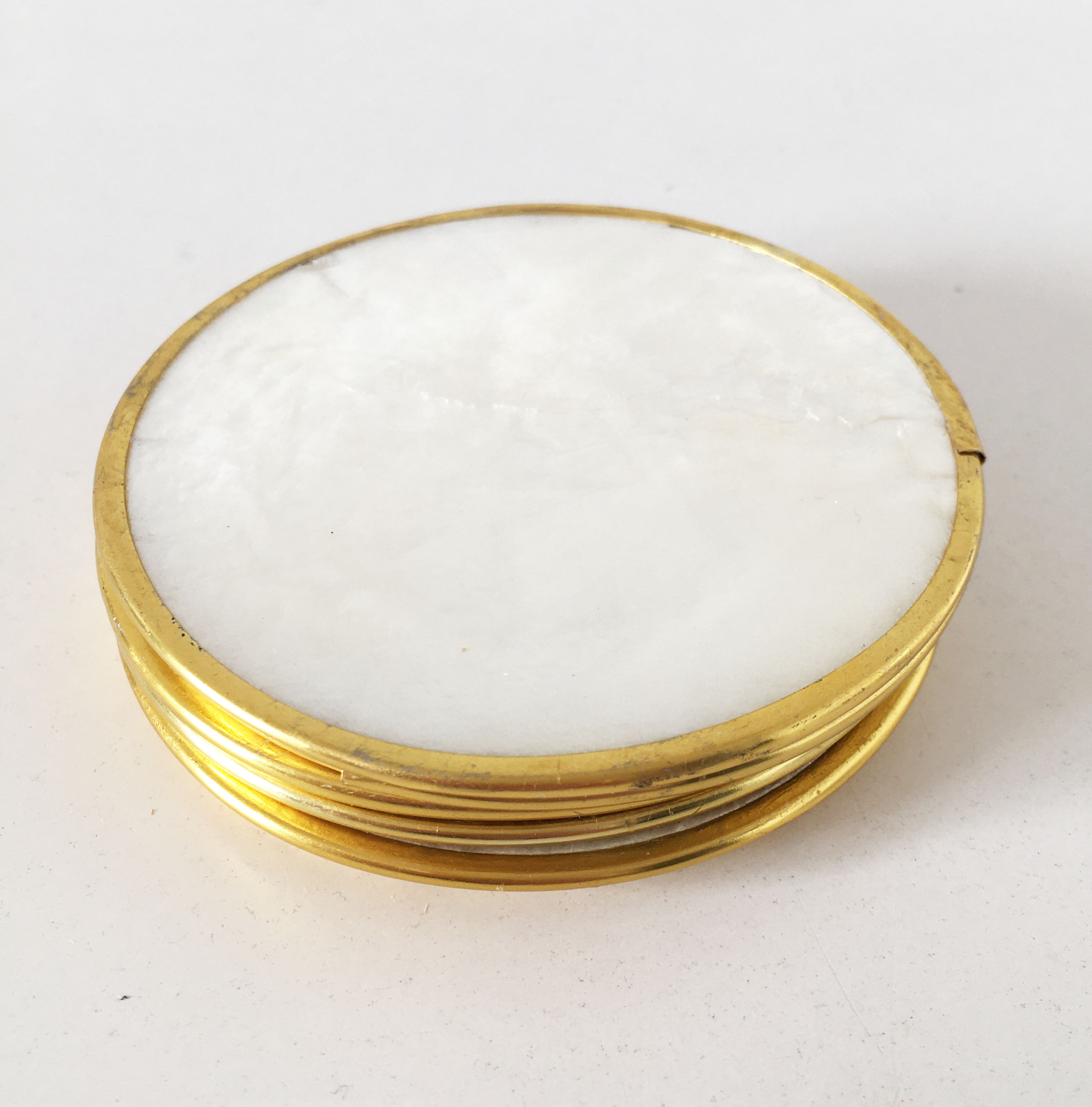 6 vintage mother-of-pearl coasters