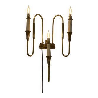 Monumental bronze wall light with three arms, neoclassical Art Deco from the 1940s.