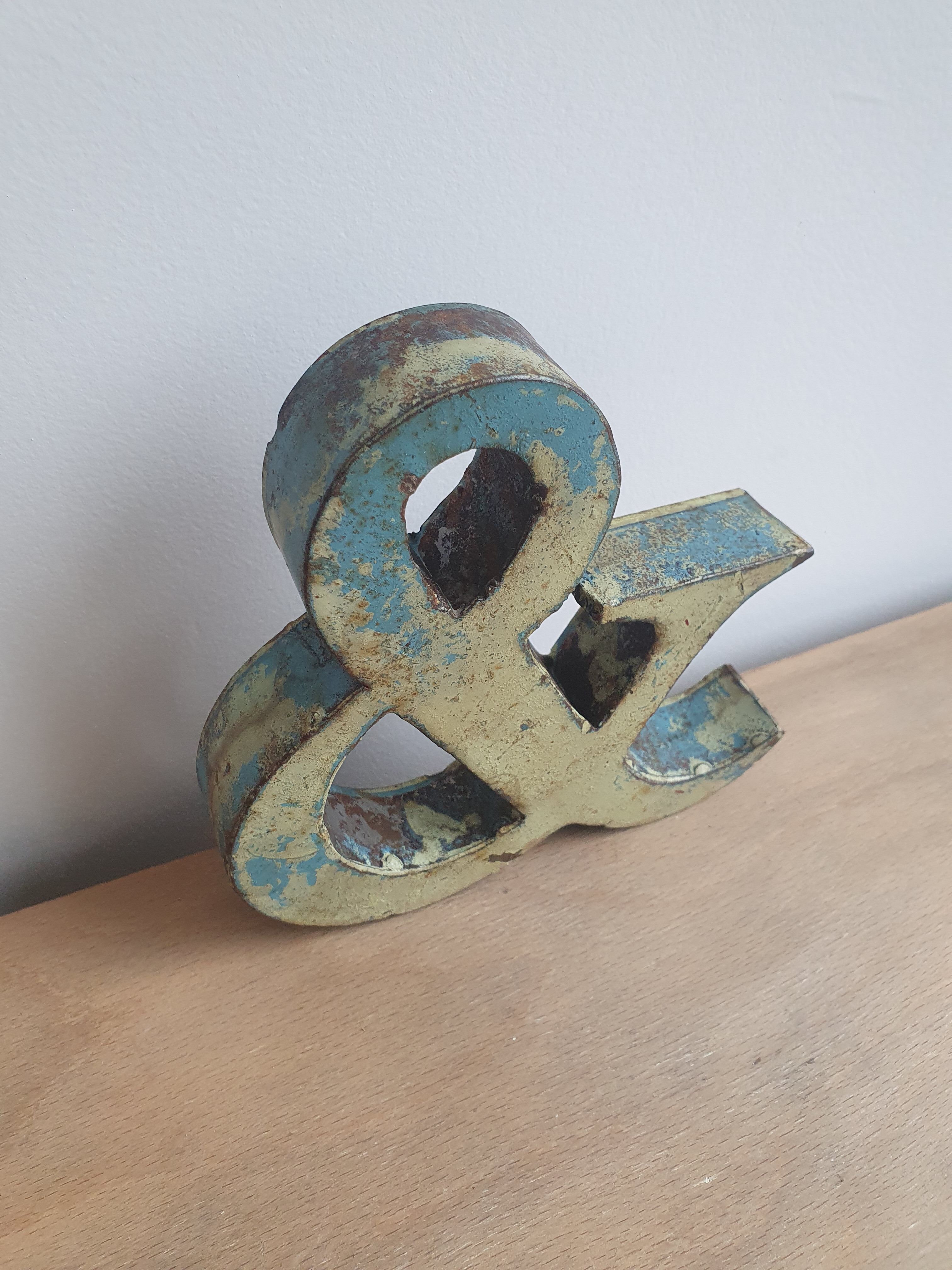 Ancient iron letter